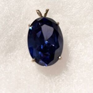 Deep Purple/Blue Oval Stone Pendant in Silver Setting
